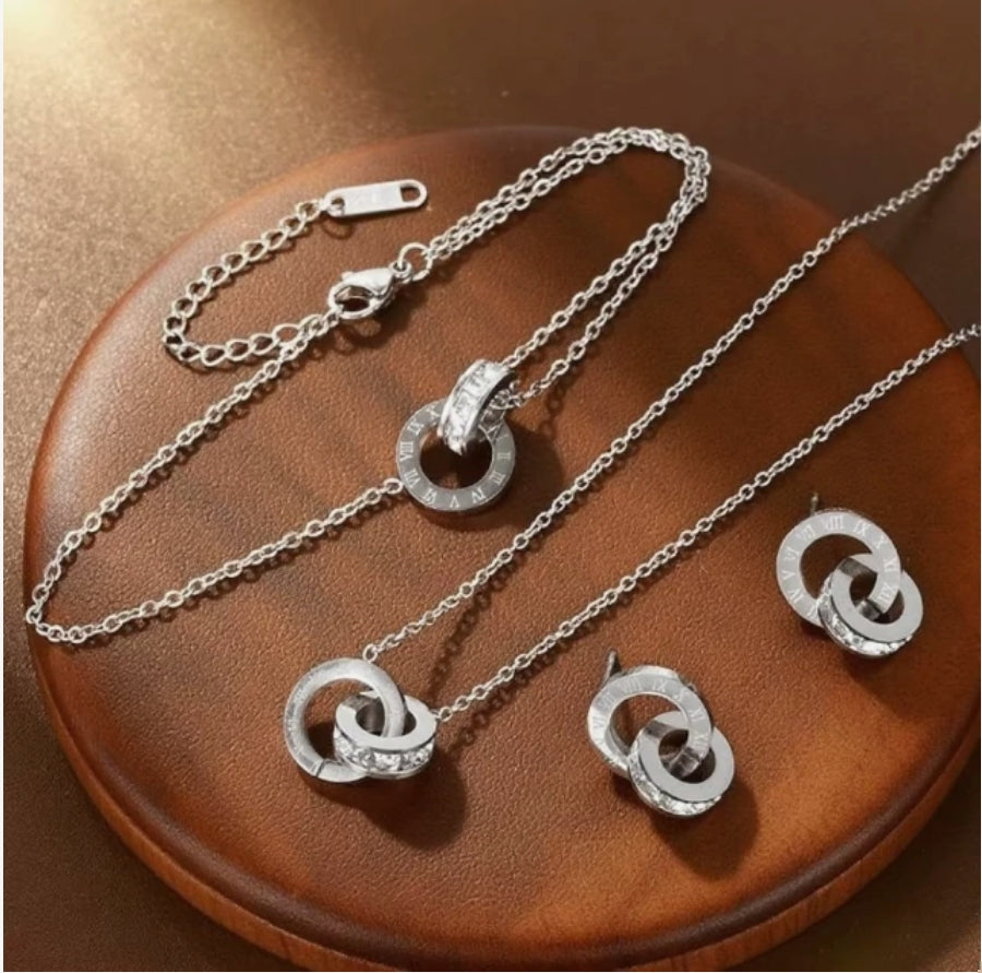 Set de Aretes y collar Vínculo